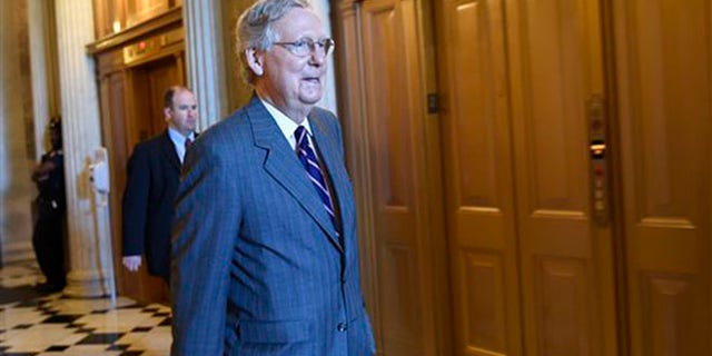 Senate Majority Leader Mitch McConnell of Ky. walks to a Republican luncheon on Capitol Hill in Washington, Friday, May 22, 2015.