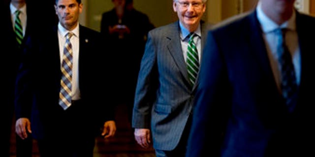 Senate Majority Leader Mitch McConnell of Ky. arrives on Capitol Hill in Washington, Thursday, June 22, 2017, as Senate Republicans work on a health reform bill. Senate Republicans would cut Medicaid, end penalties for people not buying insurance and erase a raft of tax increases as part of their long-awaited plan to scuttle Barack Obama's health care law. (AP Photo/Andrew Harnik)