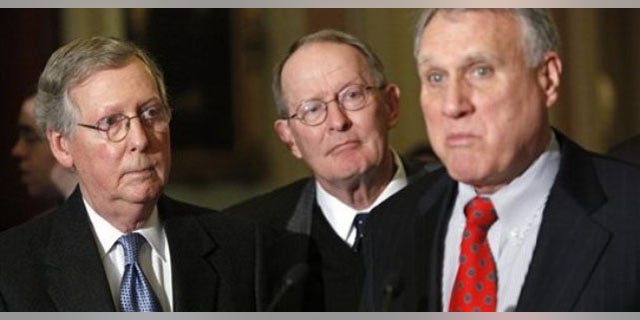 Tuesday: Senate Minority Leader Mitch McConnell of Ky., left, and Sen. Lamar Alexander, R-Tenn., center, listen to Senate Minority Whip Jon Kyl of Ariz., have tried unsuccessfully many different ways to stop the health insurance bill. (AP Photo)