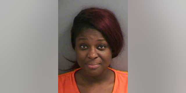 Widna St. Jean was arrested and charged after allegedly escalating an argument over the freshness of bacon.
