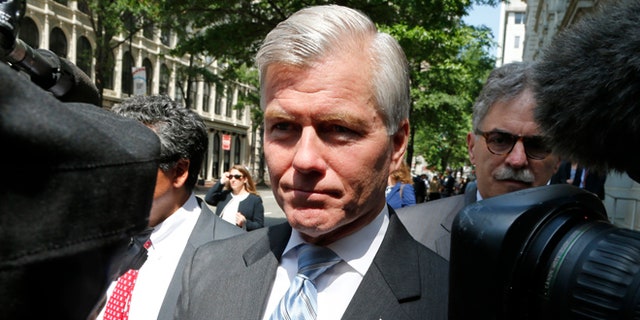 May 12, 2015: Former Virginia Gov. Bob McDonnell navigates a group of cameras as he leaves the 4th U.S. Circuit Court of Appeals after a hearing the appeal of his corruption conviction in Richmond, Va. (AP)