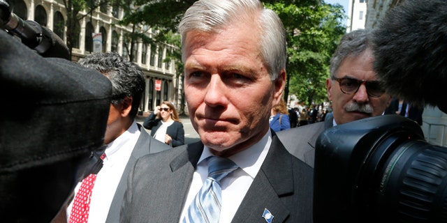 May 12, 2015: Former Virginia Gov. Bob McDonnell navigates a group of cameras as he leaves the 4th U.S. Circuit Court of Appeals after a hearing the appeal of his corruption conviction in Richmond, Va. (AP)