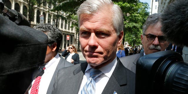 May 12, 2015: Former Virginia Gov. Bob McDonnell navigates a group of cameras as he leaves the 4th U.S. Circuit Court of Appeals after a hearing the appeal of his corruption conviction in Richmond, Va. (AP)