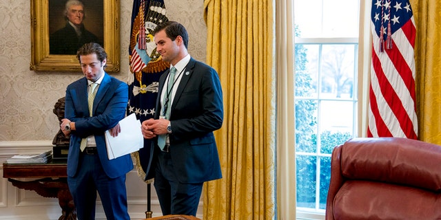 John McEntee, right, a former UConn quarterback who serves as the president’s personal aide, was ousted from his official job, given a new job with the Trump campaign and escorted from the White House under mysterious circumstances.