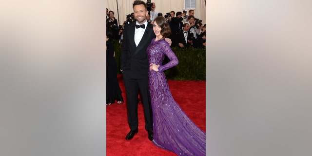 Joel McHale, left, and Alison Brie arrive at The Metropolitan Museum of Art's Costume Institute benefit gala celebrating "China: Through the Looking Glass" on Monday, May 4, 2015, in New York.