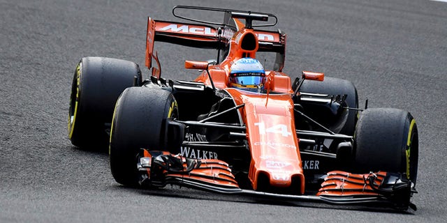 Mclaren driver Fernando Alonso of Spain steers his car during the Belgian Formula One Grand Prix in Spa-Francorchamps, Belgium, Sunday, Aug. 27, 2017. (AP Photo/Geert Vanden Wijngaert)