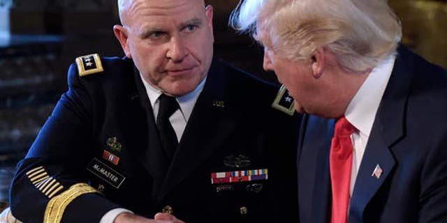 President Donald Trump, right, shakes hands with Army Lt. Gen. H.R. McMaster, left, at Trump's Mar-a-Lago estate in Palm Beach, Fla., Monday, Feb. 20, 2017, where he announced that McMaster will be the new national security adviser. (AP Photo/Susan Walsh)