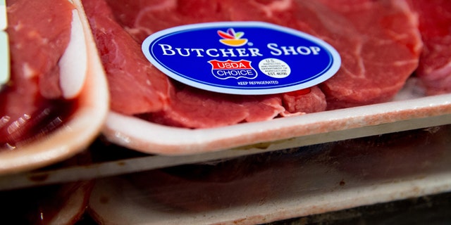 In this photo taken May 19, 2015, meat labels are seen at a grocery store in Washington. It's now harder to find out where your meat was born, raised and slaughtered. After more than a decade of wrangling, Congress repealed a meat labeling law last month that required retailers to include the animalâs country of origin on packages of pork and beef. It's a major victory for the meat industry, which has fought the law in Congress and the courts since the early 2000s. (AP Photo/Andrew Harnik)
