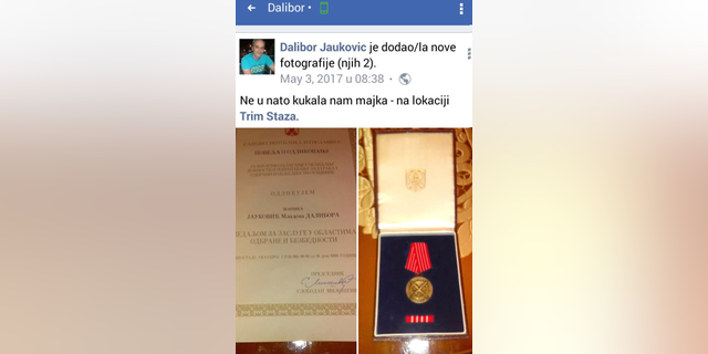 An image apparently posted to the dead bomber's Facebook page last year shows an award apparently signed by former Serbian strongman Slobodan Milosevic.