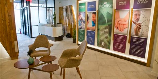 The reception area of Columbia Care, one of New York City's first medicinal marijuana dispensaries, is seen, Wednesday, Jan. 6, 2016, in New York. New Yorkers with cancer, AIDS, Parkinson's disease or other qualifying conditions will be able to obtain medical marijuana as early as Thursday, 18 months after lawmakers passed what is considered one of the strictest medical cannabis programs in the nation. (AP Photo/Mary Altaffer)