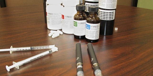 This Jan. 5, 2016 file photo shows packaging for medical marijuana at Vireo Health of New York, a dispensary in White Plains, N.Y. Uncertainty prevails in Ohio as a law legalizing medical marijuana under very limited circumstances is set to take effect Thursday, Sept. 8, 2016. (AP Photo/Jennifer Peltz, File)