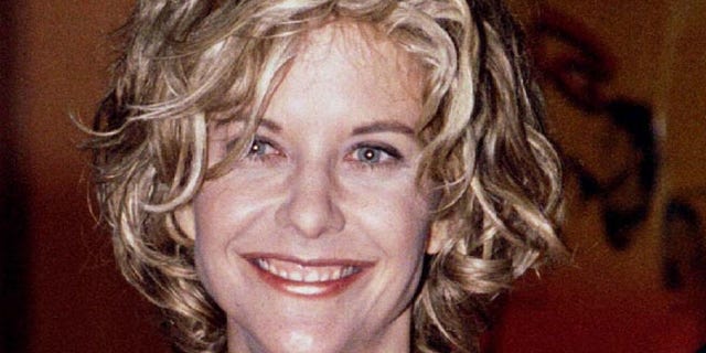Meg Ryan, one of the stars of the new film "Courage Under Fire," poses at the film's premiere July 8. The film also stars Denzel-Washington. - RTXGMT1