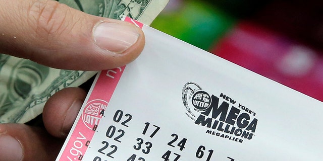 A ticket is seen ahead of the Mega Millions lottery draw in Manhattan, New York, US, July 1, 2016.