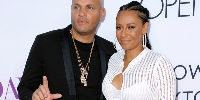 In this April 13, 2016 file photo, Stephen Belafonte, left, and his wife Melanie Brown arrive at the Los Angeles premiere of