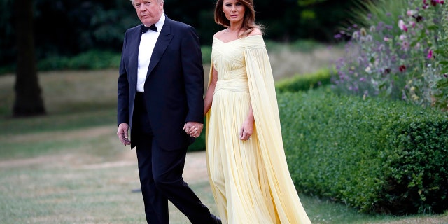 President Donald Trump and first lady Melania Trump leave Winfield House, residence of the U.S. Ambassador, before boarding Marine One helicopter for the flight to nearby Blenheim Palace, Thursday, July 12, 2018, in London.