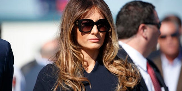 Melania Trump watches her husband, Republican presidential candidate Donald Trump, speak during a campaign rally, Saturday, Nov. 5, 2016, in Wilmington, N.C. (AP Photo/Evan Vucci)