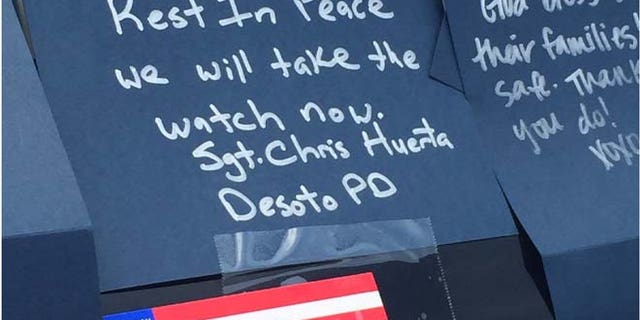 Notes lefts at memorial to five fallen officers at Dallas Police Headquarters. (Melissa Jacobs)