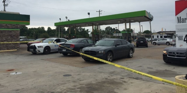An off-duty police shot at multiple suspects after they robbed him at gunpoint.
