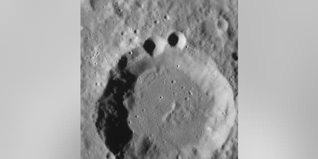 Craters photographed by MESSENGER spacecraft may appear to resemble a familiar television character, a favorite of children. Image acquired August 29, 2012.