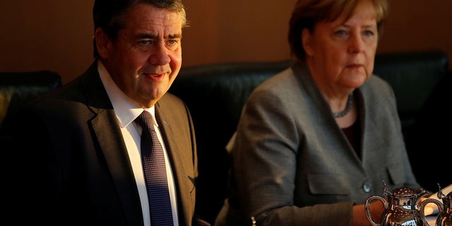 German Foreign Minister Sigmar Gabriel (left) is a supporter of the Iranian nuclear deal. German Chancellor Angela Merkel (right) confirmed Germany is one of Iran's most important trade partners.