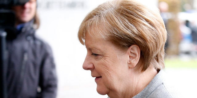 Leader of the Christian Democratic Union (CDU) Angela Merkel arrives at the Baden-Wuerttemberg State Representation office for talks about forming a new coalition government in Berlin, Germany, Nov. 19, 2017.