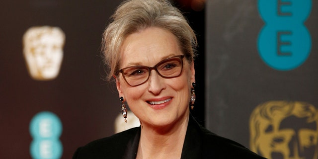 Meryl Streep denies a claim that she refused to wear a Chanel dress unless she received payment.