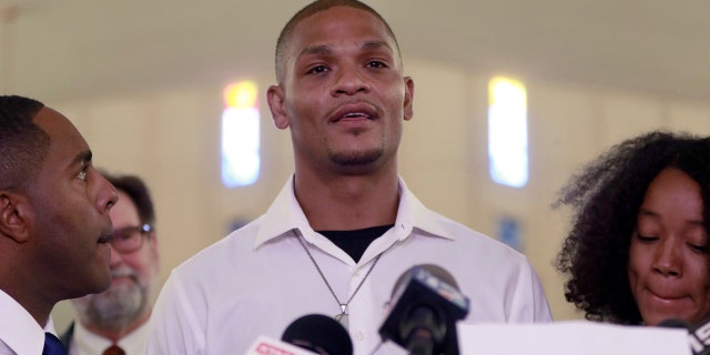 In this June 7, 2018, file photo, Robert Johnson, 35, speaks at New Beginnings Christian Church in Mesa, Ariz