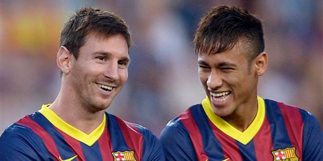 Lionel Messi and Neymar before a match against Santos on Friday, Aug. 2, 2013, in Barcelona.