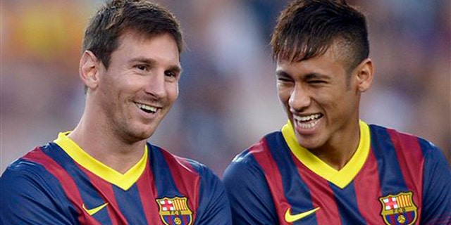 Lionel Messi and Neymar before a match against Santos on Friday, Aug. 2, 2013, in Barcelona.