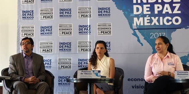 Researcher Luis Daniel Vazquez, Mexican Institute for the Economy and Peace coordinator Patricia de Obeso and Peace Promotion ABP director Consuelo Bañuelos during a press conference in Mexico City, Mexico, April 4, 2017.