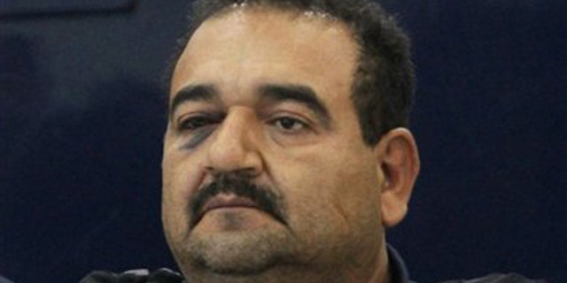 Martin Rosales Magana, alias "El Terry," is presented to the press by federal police in Mexico City, Wednesday Oct. 5, 2011.
