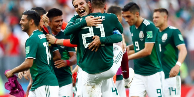 Mexico players celebrate after winning the group F match between Germany and Mexico at the 2018 soccer World Cup in the Luzhniki Stadium in Moscow, Russia, Sunday, June 17, 2018. Mexico won 1-0.