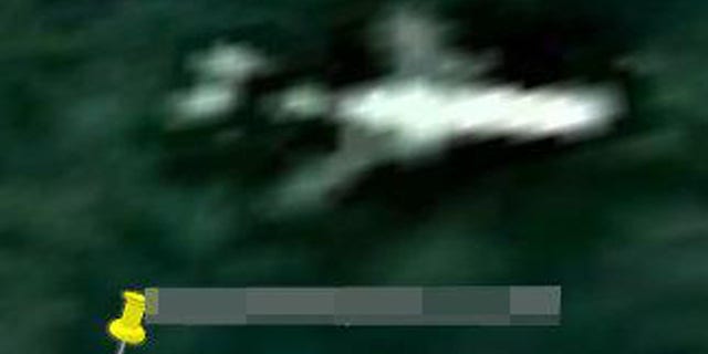 The image from Google Maps appears to show a large plane in the jungle in Cambodia.