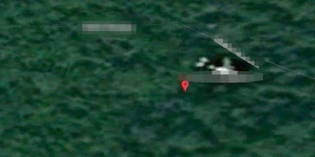 The image from the Cambodian jungle is where data from data from satellite firm Inmarsat maps shows where MH370 could have traveled.