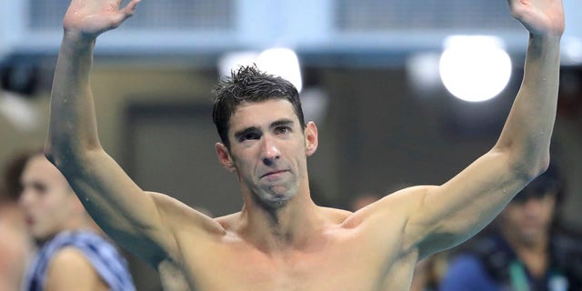2016 Rio Olympics - Swimming - Final - Men's 4 x 100m Medley Relay Final - Olympic Aquatics Stadium - Rio de Janeiro, Brazil - 13/08/2016. Michael Phelps (USA) of USA reacts.