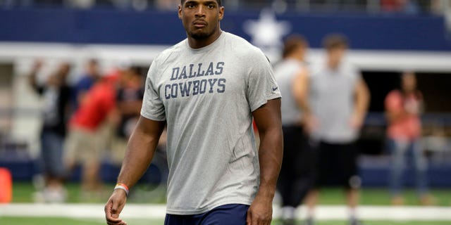 Sept. 7, 2014. Former Dallas Cowboys Michael Sam walking on the field before the first half of an NFL football game in Arlington, Texas.