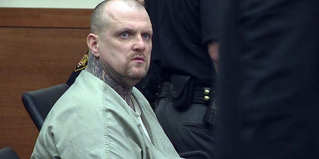 Michael Slager, seen in court, is accusing of dousing his girlfriend Judy Malinowski with gasoline and setting her on fire. He goes on trial for her murder in July.