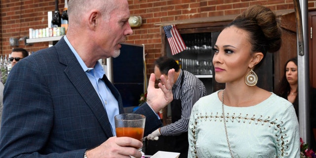Michael Darby, left, and wife Ashley Boalch Darby on an episode of "The Real Housewives of Potomac."