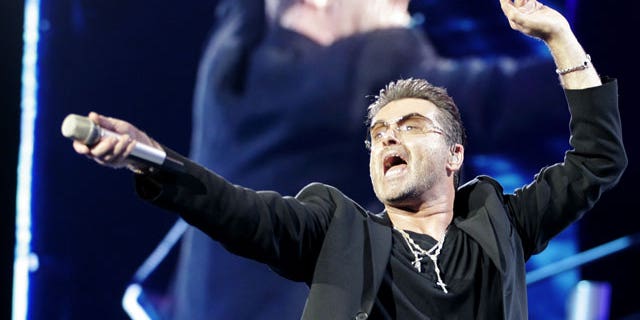 George Michael performs during his concert as part of his 25 Live European tour at the OAKA Stadium in Athens, July 26, 2007. (REUTERS)