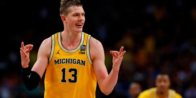 Michigan's Moritz Wagner (13) reacts after scoring a 3-point shot against Loyola-Chicago on Saturday in San Antonio.