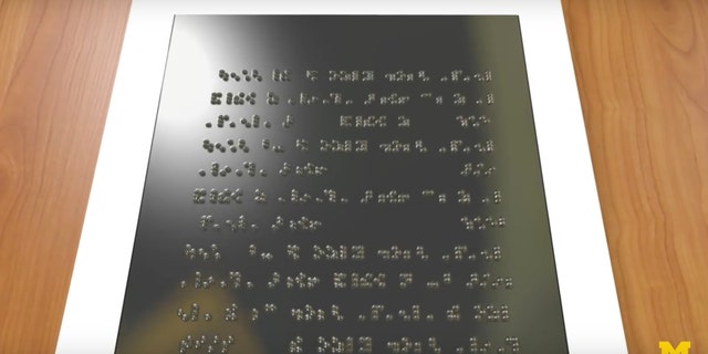 Artist's impression of a Braille tablet (Credit: Kelly O'Sullivan, Michigan Engineering)
