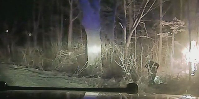 A sheriff's deputy in Michigan raced to rescue a teenager from a burning vehicle.