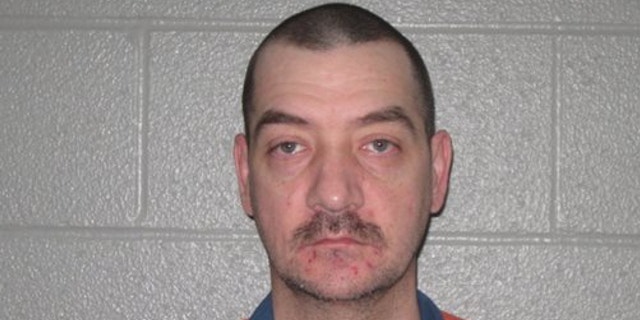 Nov. 22, 2013: This photo released by the Michigan Department of Corrections shows Jamie L. Peterson, 39, who is serving life without parole for first-degree murder and rape in the 1996 killing of Geraldine Montgomery at her home in Kalkaska, Mich.