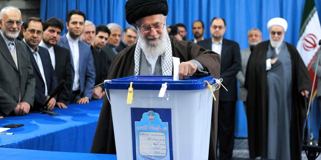 FILE -- Feb. 26, 2016: In this photo released by official website of the office of the Iranian supreme leader, Supreme Leader Ayatollah Ali Khamenei casts his ballot during parliamentary and Experts Assembly elections in Tehran, Iran. (Office of the Iranian Supreme Leader via AP)