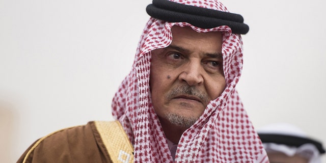 Jan. 5, 2014: Saudi Foreign Minister Prince Saud al-Faisal waits to greet U.S. Secretary of State John Kerry as Kerry arrives at King Khalid International Airport in Riyadh, Saudi Arabia.