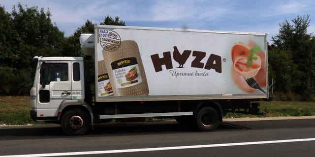 Aug. 27: A truck stands on the shoulder of the highway A4 near Parndorf south of Vienna, Austria. At least 20 migrants were found dead in the truck.