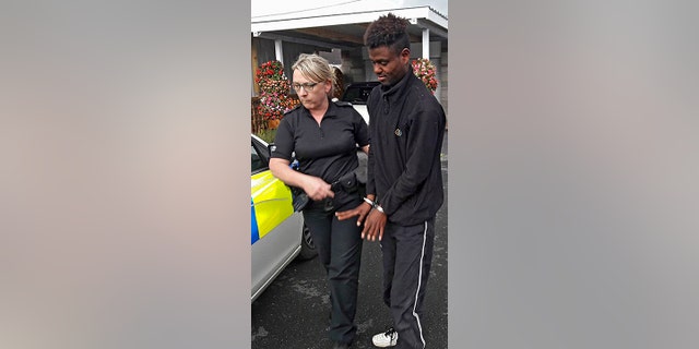 Paul Edmunds gave the Ethiopian migrant chocolate and water while they waited for police to arrive. He was then turned over to UK immigration officials.