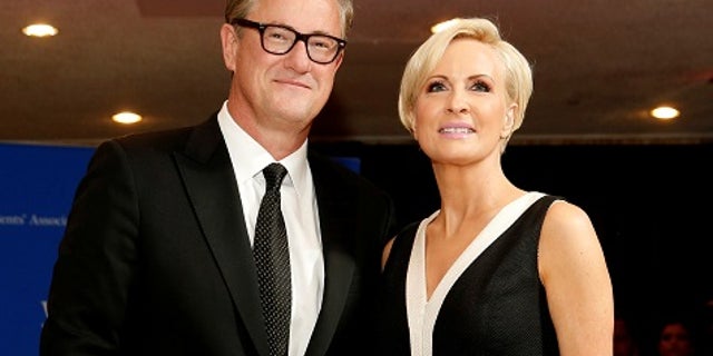 FILE PHOTO: MSNBC's Joe Scarborough and Mika Brzezinski arrive for the annual White House Correspondents' Association dinner in Washington, U.S. on April 25, 2015. REUTERS/Jonathan Ernst/File Photo - RC173125CB70