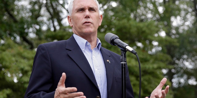 FILE - Republican vice presidential candidate, Indiana Gov. Mike Pence comments after receiving a national security briefing in Indianapolis, Friday, Sept. 9, 2016.