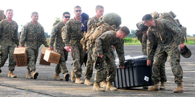 FILE: Oct. 9, 2014: marines arrival at the Roberts International airport in Monrovia, Liberia.